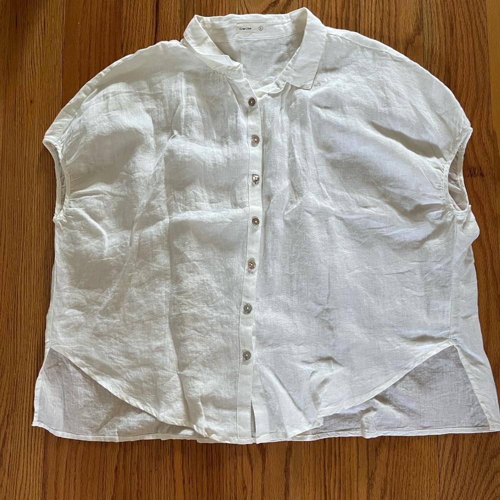 Bright white linen button up shirt. Never worn, size large.